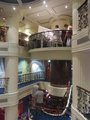 Grand piano in the atrium above the dining room